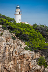 Fototapeta na wymiar Capdepera lighthouse, Far de Capdepera, at Punta de Capdepera in