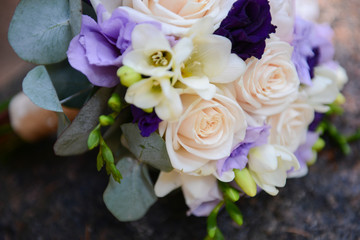 bridal bouquet of fresh roses on the table. wedding floristry, floristic decorative statement