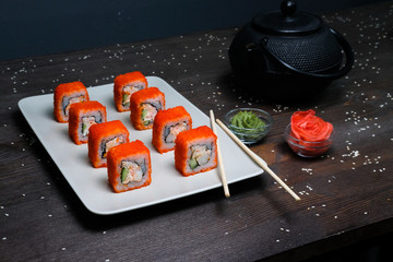 japanese rolls  served on plate on wood table