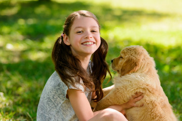 Joyous girl with her pet