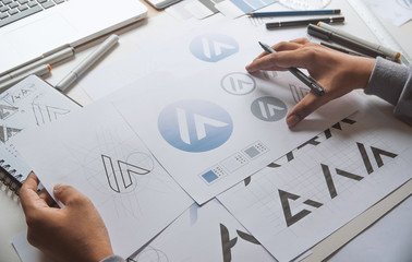 Graphic designer development process drawing sketch design creative Ideas draft Logo product...