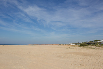Fototapeta na wymiar View from the beach to the Spanish city of Conil de la frontera in Andalucia