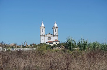 small christian chapel in a village in portugal