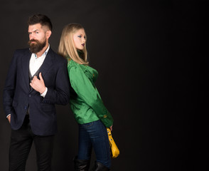 Enjoying friendly relations. Autumn street style. Love relations. Autumn fashion trends. Couple in love in fashionable style. Fashion couple of sexy woman and bearded man. Feeling flirty, copy space