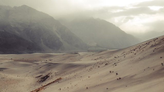 Sunset after sandstorm at the cold dersert. Skardu, Gilgit Baltistan, Pakistan.