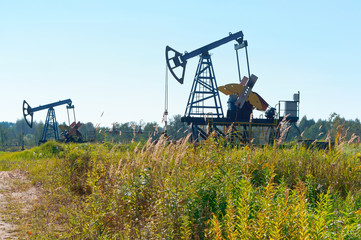 Fototapeta na wymiar Oil production facilities. Oil production complex in the field.