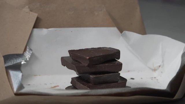 Pieces of chocolate disappearing from the wrap