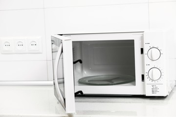 Image of the microwave oven. Modern microwave. Front view.