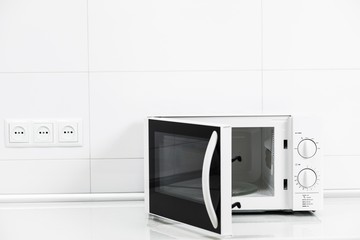 Fototapeta na wymiar Modern kitchen interior with electric and microwave oven