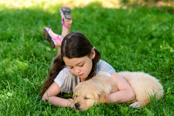 Girl is resting with dog