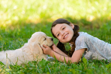Retriever puppy and its owner