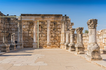 Fototapeta premium Ruins of the old synagogue in Capernaum by the Sea of Galilee, Israel.