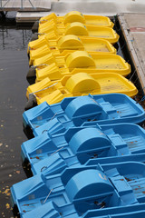 Row of paddle boats i harbor