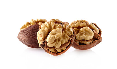 Walnuts in closeup on white background