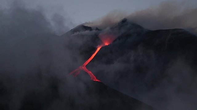 Volcano Etna eruption - Explosion and lava flow in Sicily