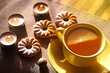 Candle, biscuit, tea