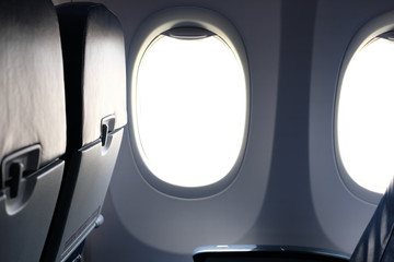 airplane window inside cabin. opening aircraft porthole