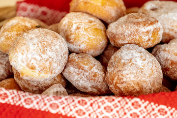 Homemade romanian doughnuts in a basket