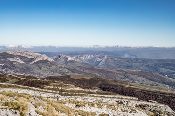 Fototapeta premium Landscape of mountains with clouds in the background