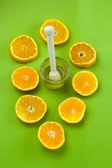 top view citrus slices and honey jar flat lay green backgroun