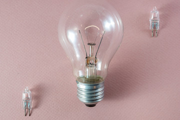 Two G4 bipin halogen lamps and a tungsten filament bulb- technology going obsolete