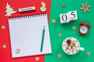 calendar December 5th cup cocoa and marshmallow, empty open notepad