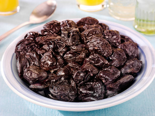 PRUNES IN BLUE BOWL