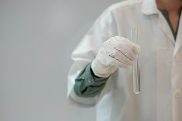 scientist working with test tube. researcher doing research investigation. chemistry biology science