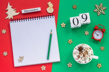 calendar December 9th cup cocoa and marshmallow, empty open notepad