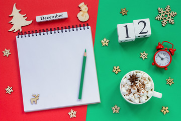 calendar December 12th cup cocoa and marshmallow, empty open notepad