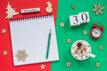 calendar December 30th cup cocoa and marshmallow, empty open notepad