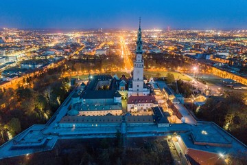 Night aerial drone view on Czestochowa and Jasna Gora monastery - obrazy, fototapety, plakaty
