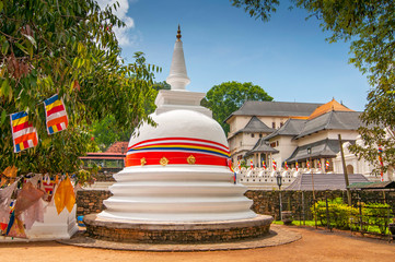 Small dagoba Buddhist temple complex and the Church of St. Paul in the historic center of Kandy, Sri Lanka. - obrazy, fototapety, plakaty