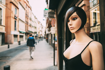 Female Mannequin Dressed In Female Casual Clothes Standing Near 