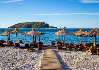 Beach with deck chairs 