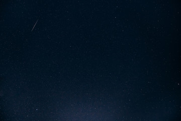 Night Starry Sky. Glowing Stars And Meteoric Tracks Trail In Dar