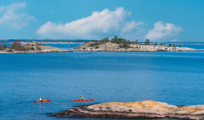 Kayaking in St. Anna archipelago, Baltic sea Sweden, a beautiful summer day