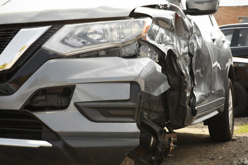 Fototapeta na wymiar Broken car after road accident, closeup view. Auto insurance