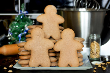 Christmas gingerbread man cookies cooking, traditional sweet treats for kids on winter holidays