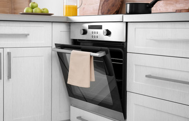 Open modern oven built in kitchen furniture