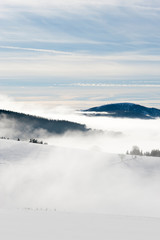 Fototapeta na wymiar Nebelschwaden ziehen über den Schwarzwald