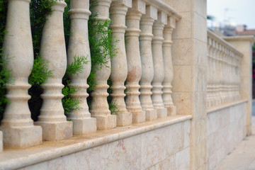 Fototapeta na wymiar a fence made of beautiful columns