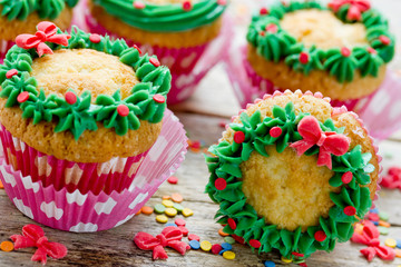 Christmas wreath cupcakes -  beautiful and delicious homemade cupcakes decorated with green cream and candy sprinkles, Christmas and New Year dessert