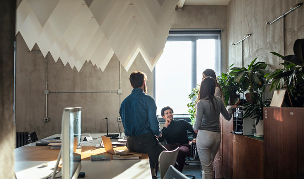Businesspeople Chatting at Office