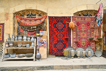 Souvenirs and old things on the shelves of Baku