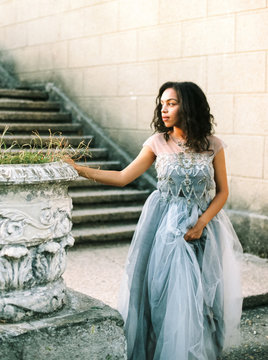 Young sensual woman in wonderful dress