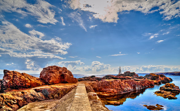 Beautiful landscape with lighthouse and blue sea © phadventure