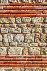 Colorful stone wall background closeup view