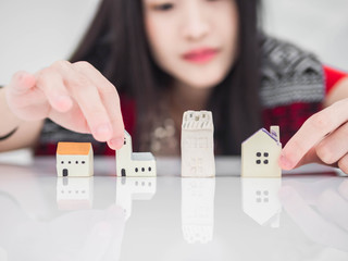 Mortgage concept by money house from the coins,Business Finance and Money concept,Saving concept to buy a house.