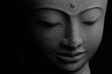 Buddha's face stone sculpture